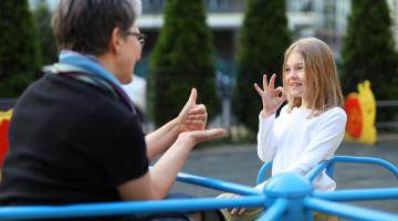 Sign language teacher playground
