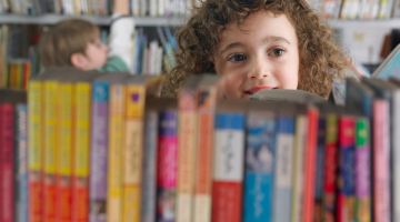 child in a library
